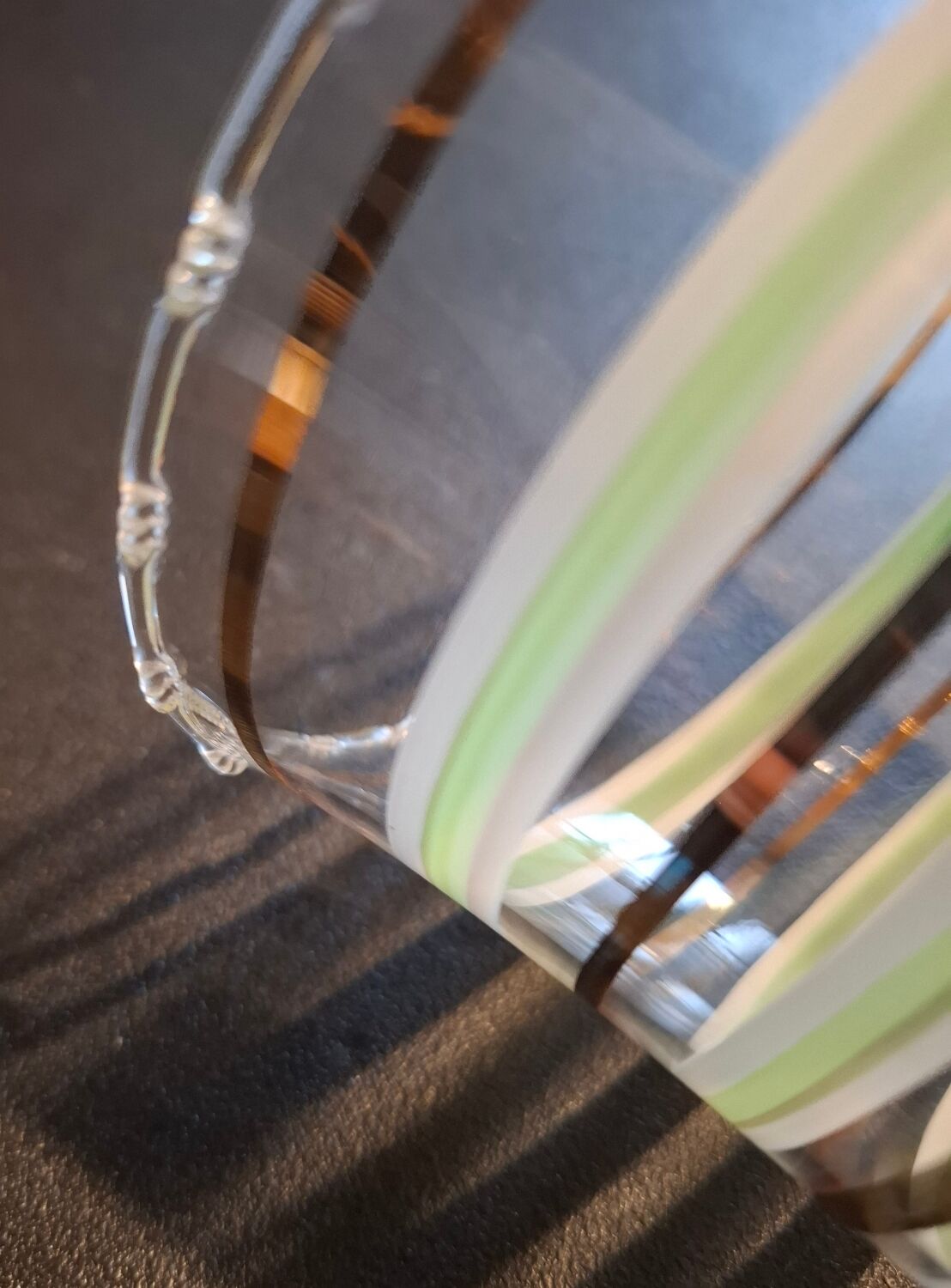 Vintage vase with green and gold trim.