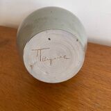 Glazed stoneware based, signed.