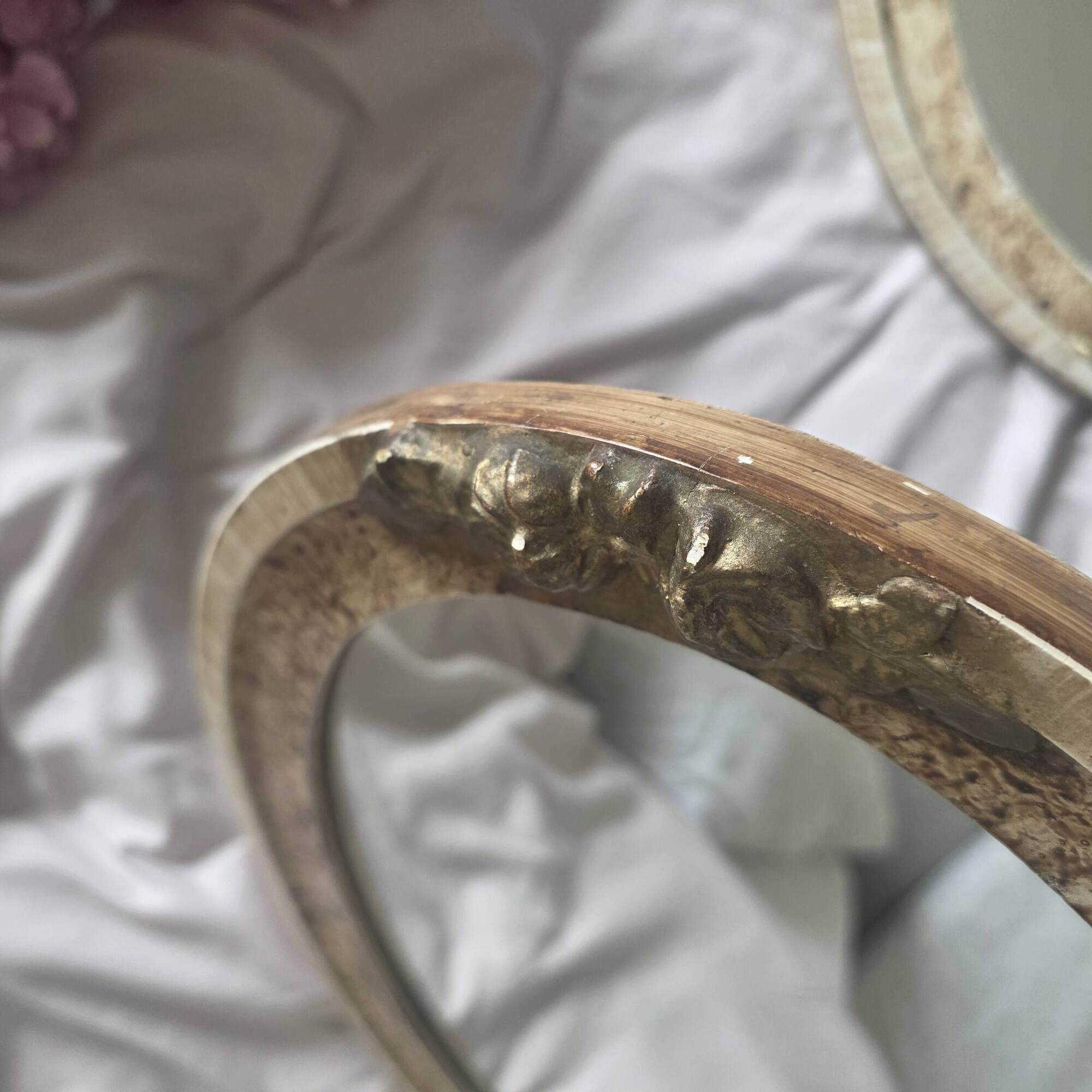 paire de miroirs ovales anciens