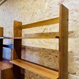 Modular wall-mounted bookcase in walnut