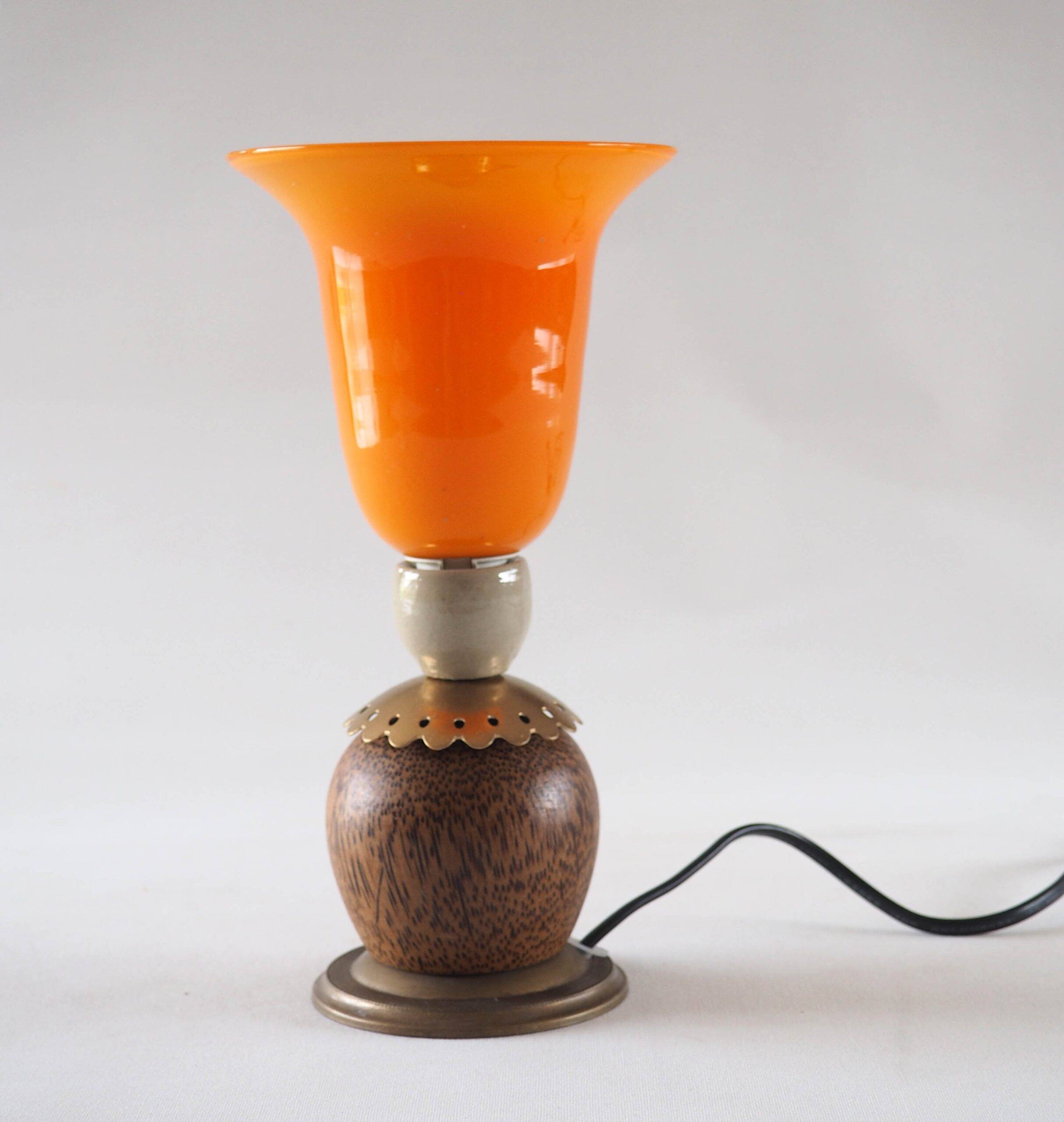 Orange glass ball lamp with wood