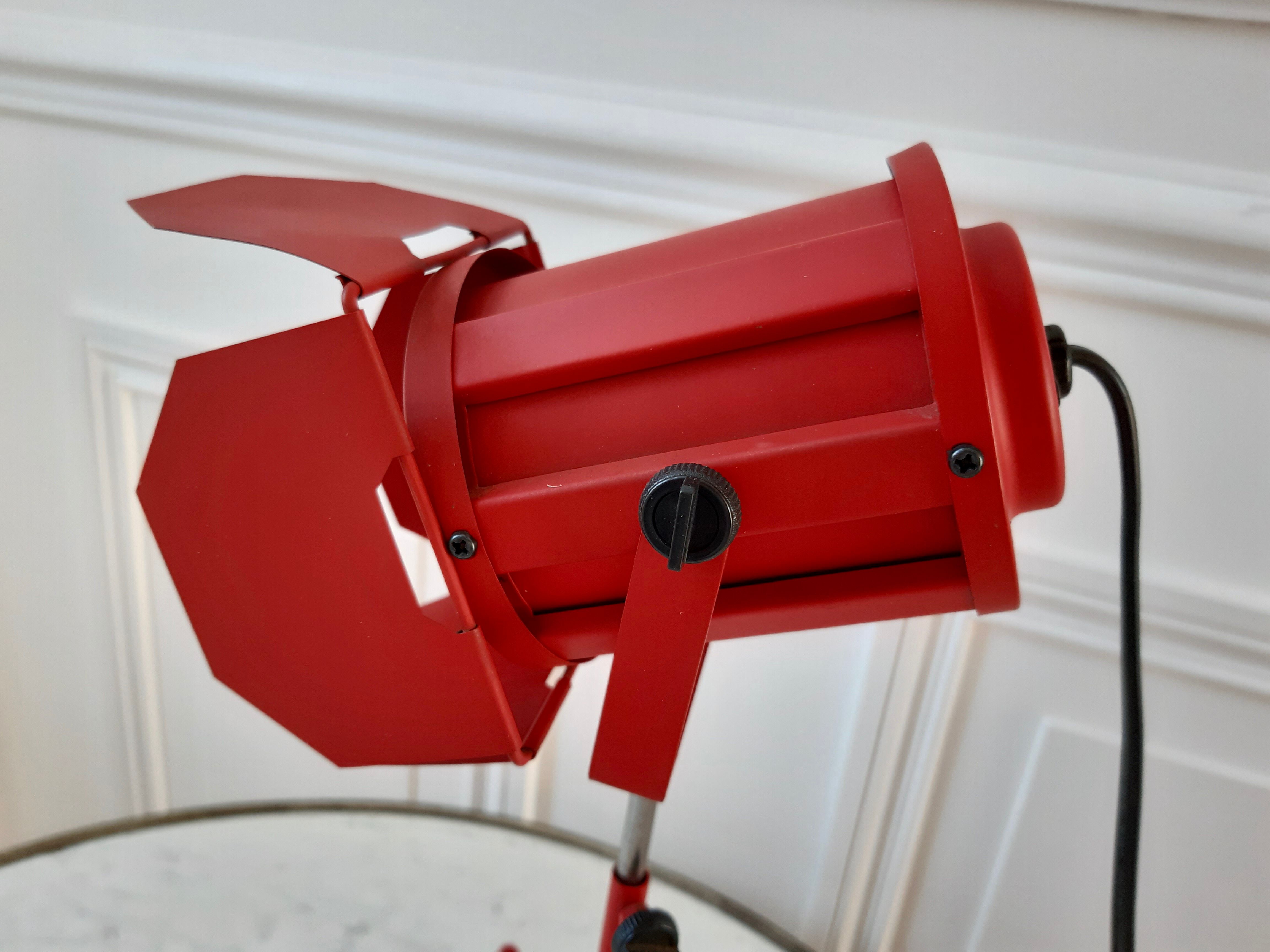 Orange-red 80s steerable cinema projector lamp