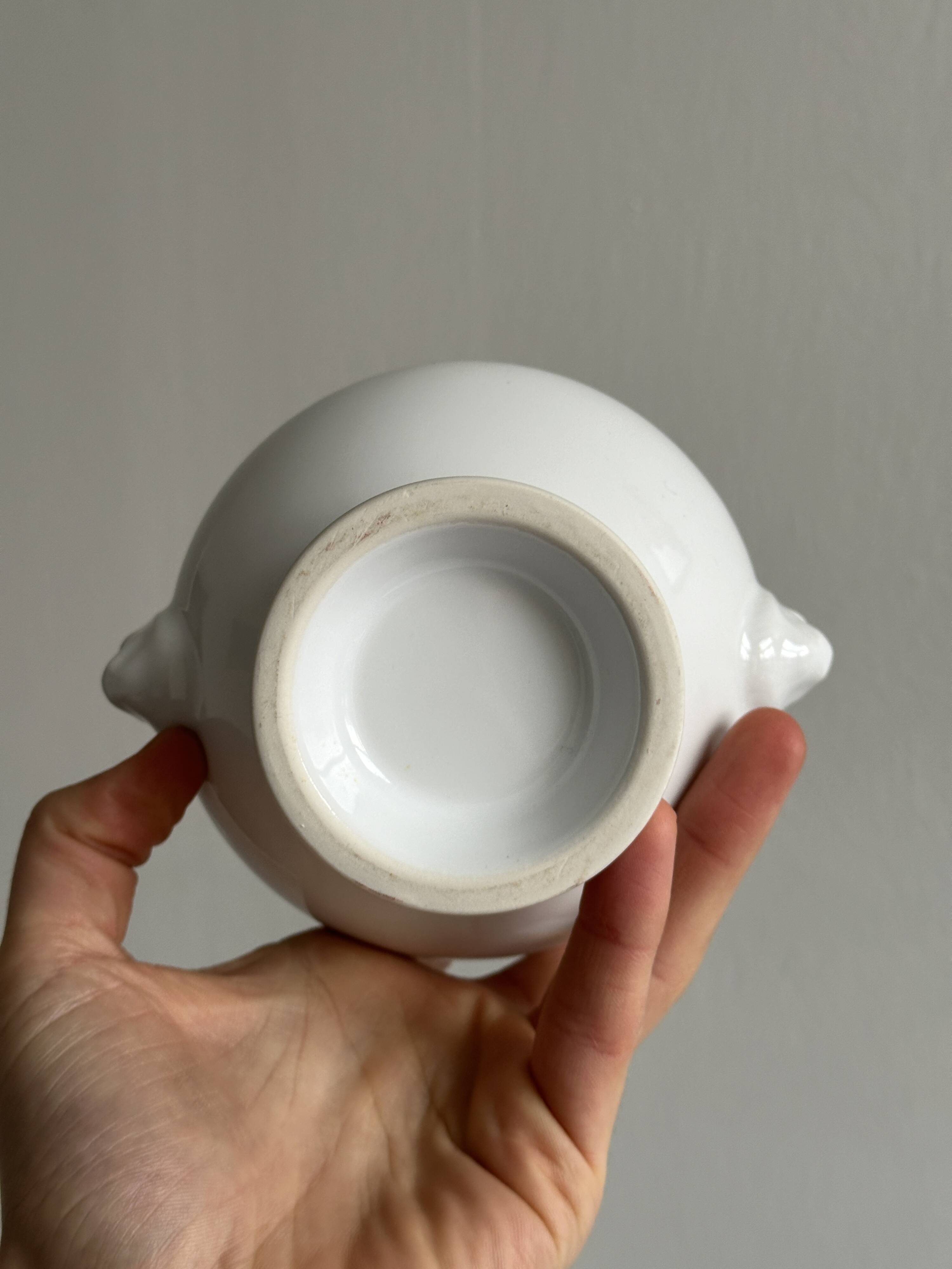 4 white porcelain bowls