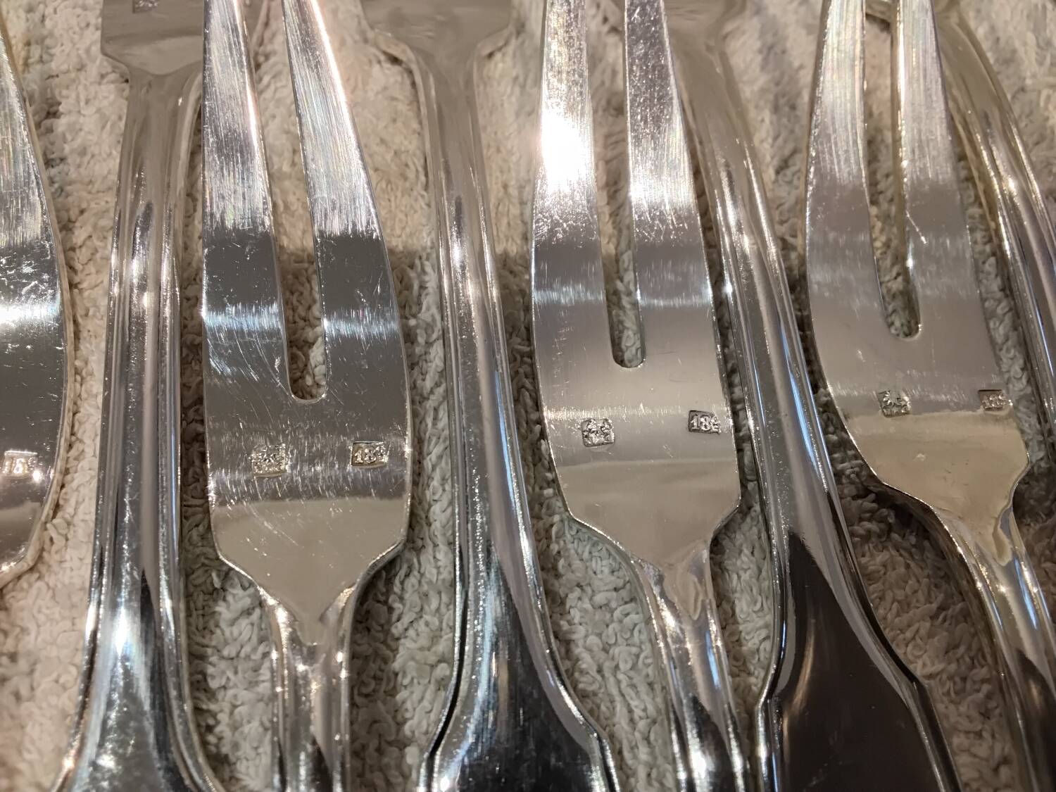 12 silver-plated metal snail forks by silversmith Noel Collet, shell design