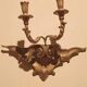Paire de appliques murales antiques en bois doré du 19ème siècle.