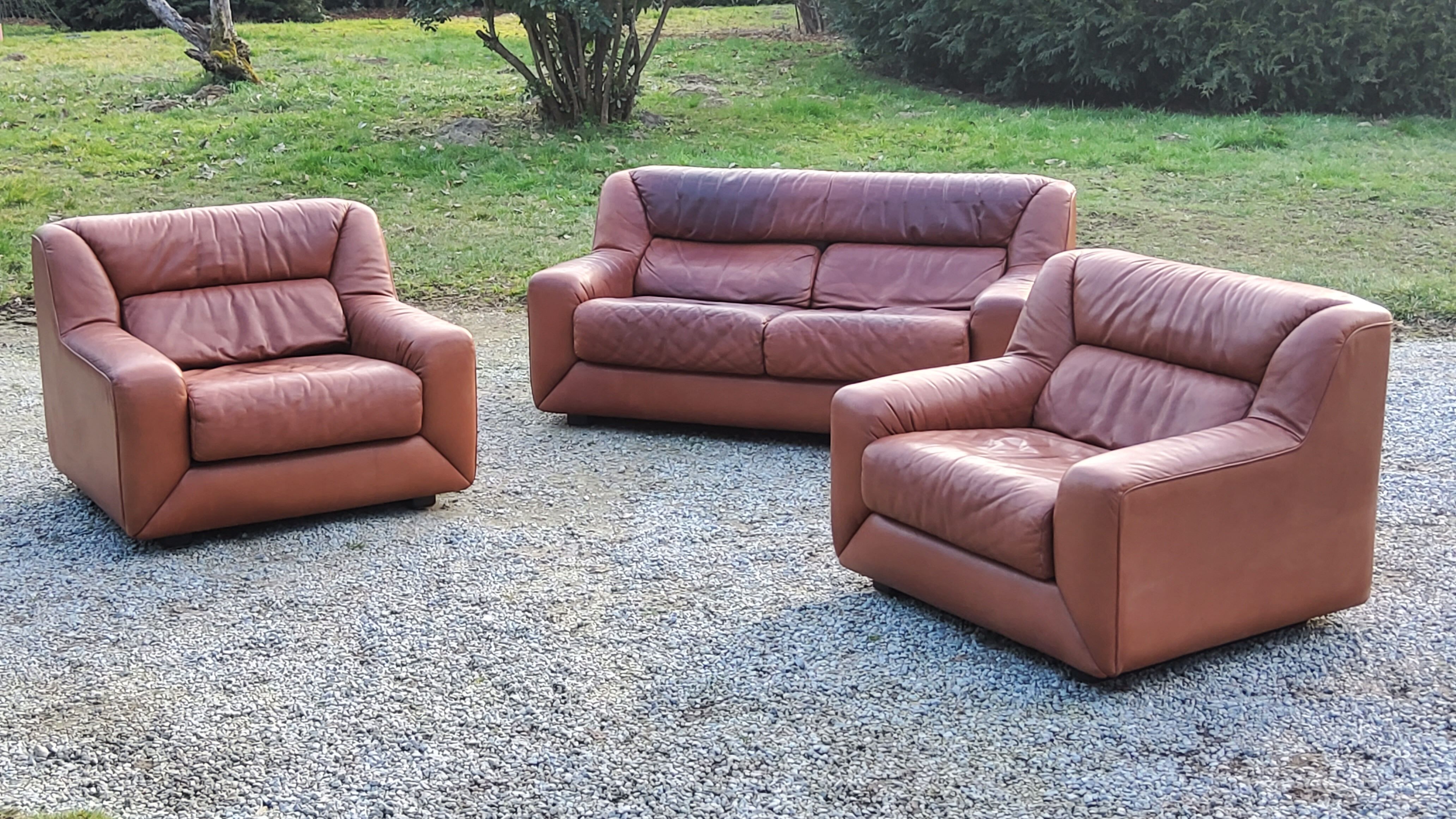 Pair of armchairs and De Sede sofa in cognac leather from the 70s/80s