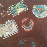 Suitcase of leather with labels of palaces