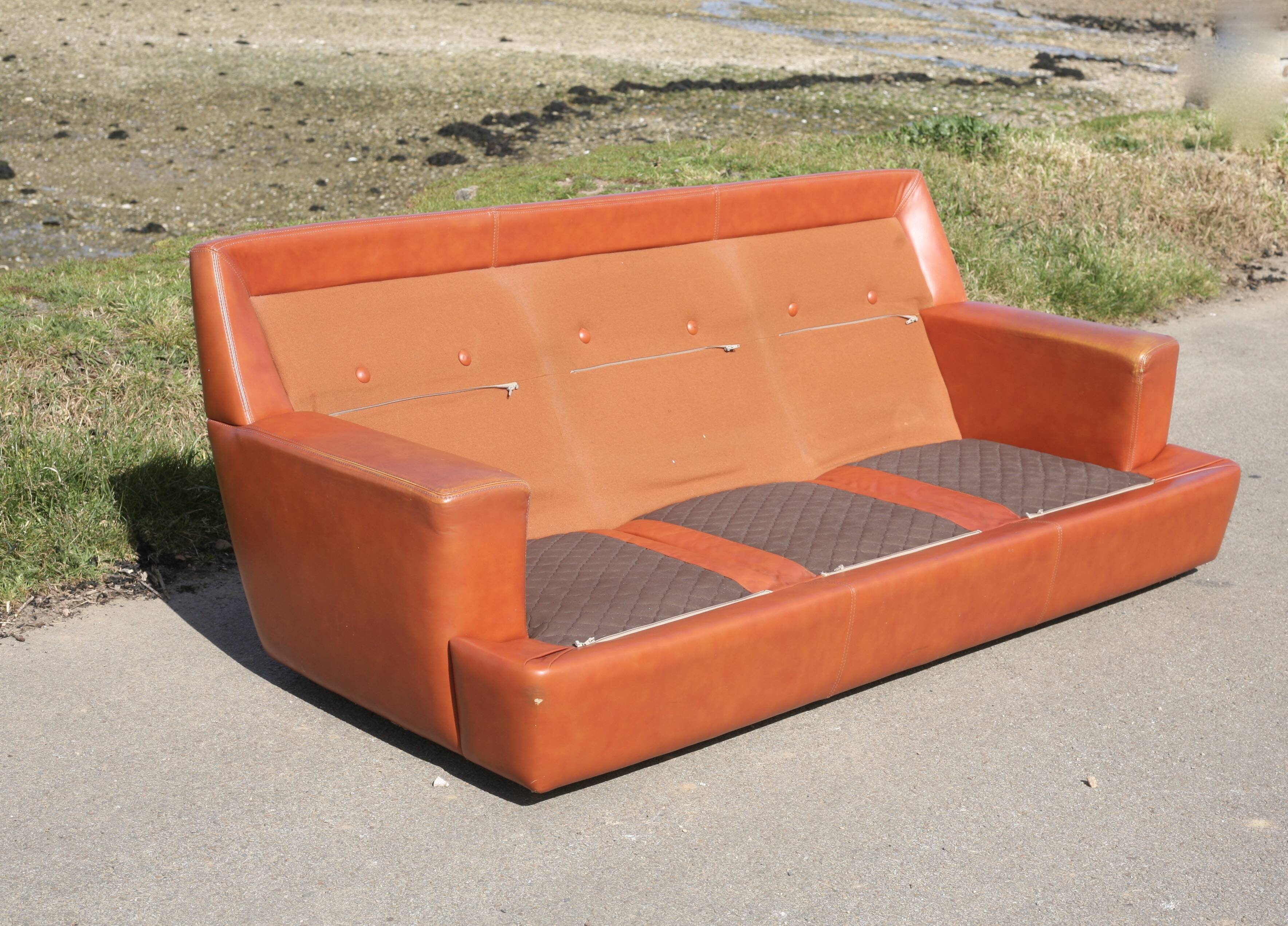 Space age sofa. Tan leather. Circa 1970