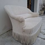 "Crapaud" bench in the richly decorated Napoleon III style.