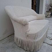 "Crapaud" bench in the richly decorated Napoleon III style.