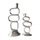 Pair of cast aluminum candle holders, design