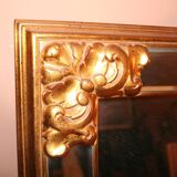 Large beaded mirror in gilded wood from the 60s