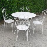 Garden furniture 1 table 4 armchairs in old white wrought iron.