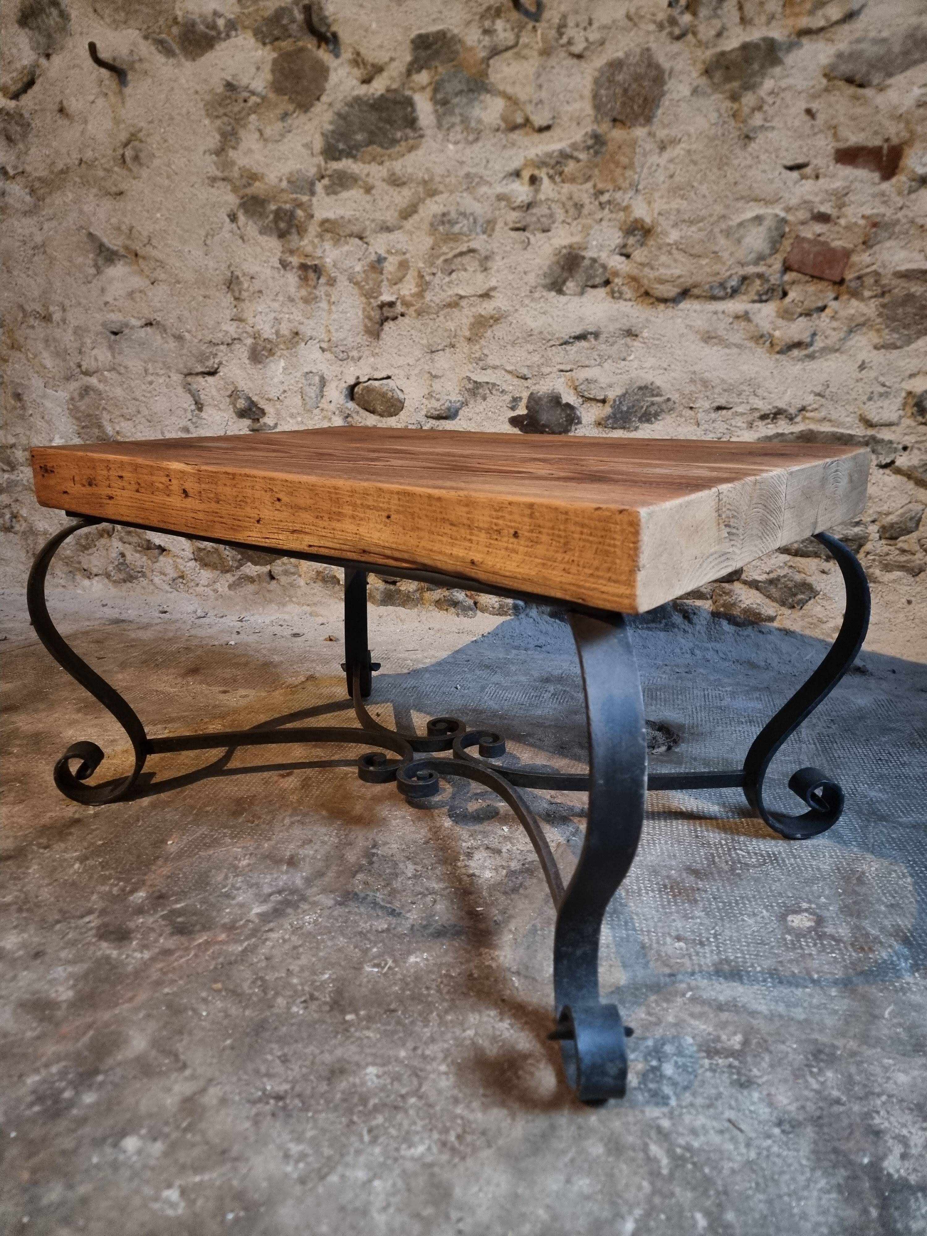 Vintage French coffee table from the 1960s – Rustic pine coffee table with a black iron base.