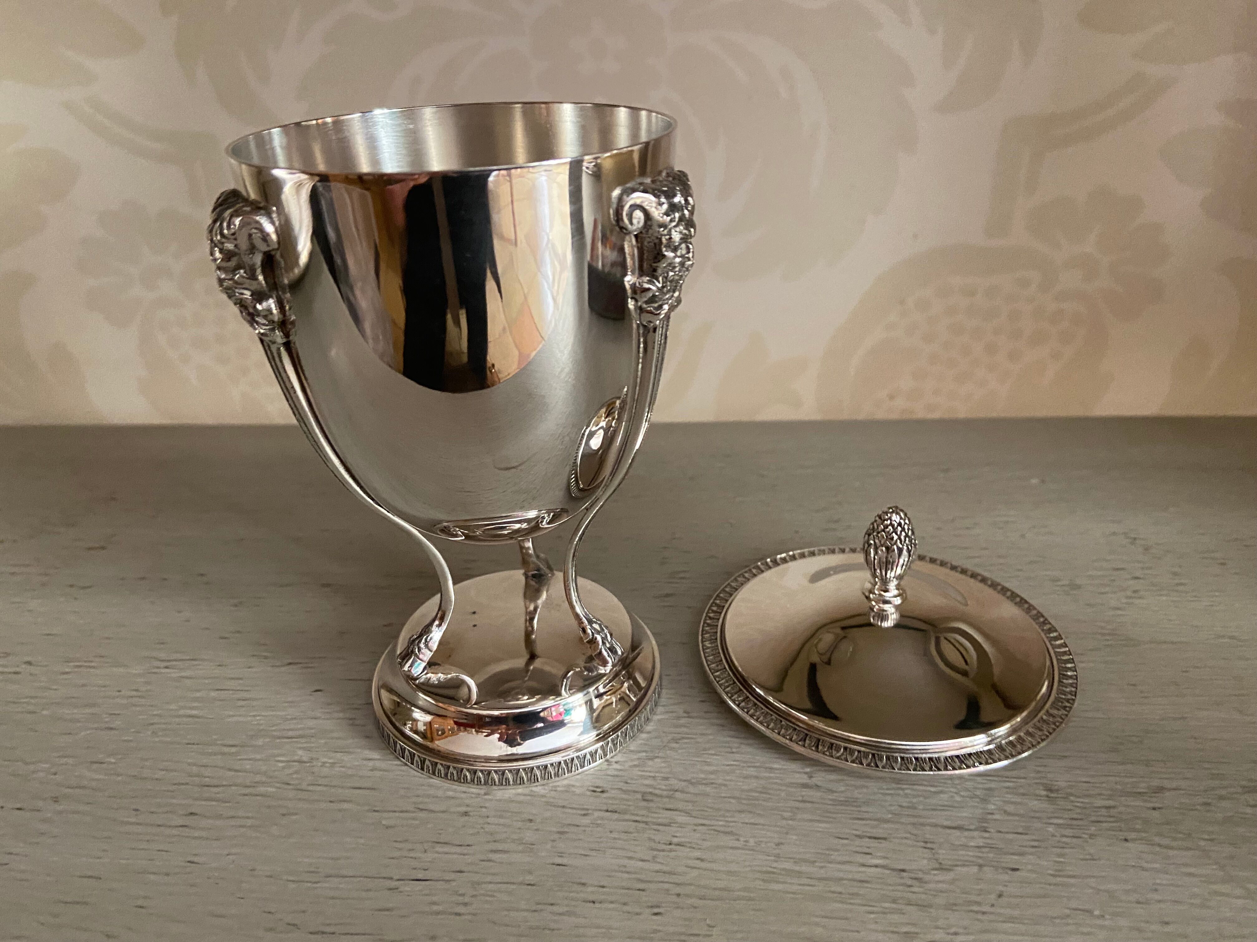 Silver metal sugar bowl on claws