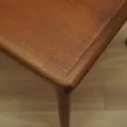 Danish extendable dining table, teak veneer, solid wood legs, leaf storage, 1970s