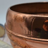 Old copper pot cover