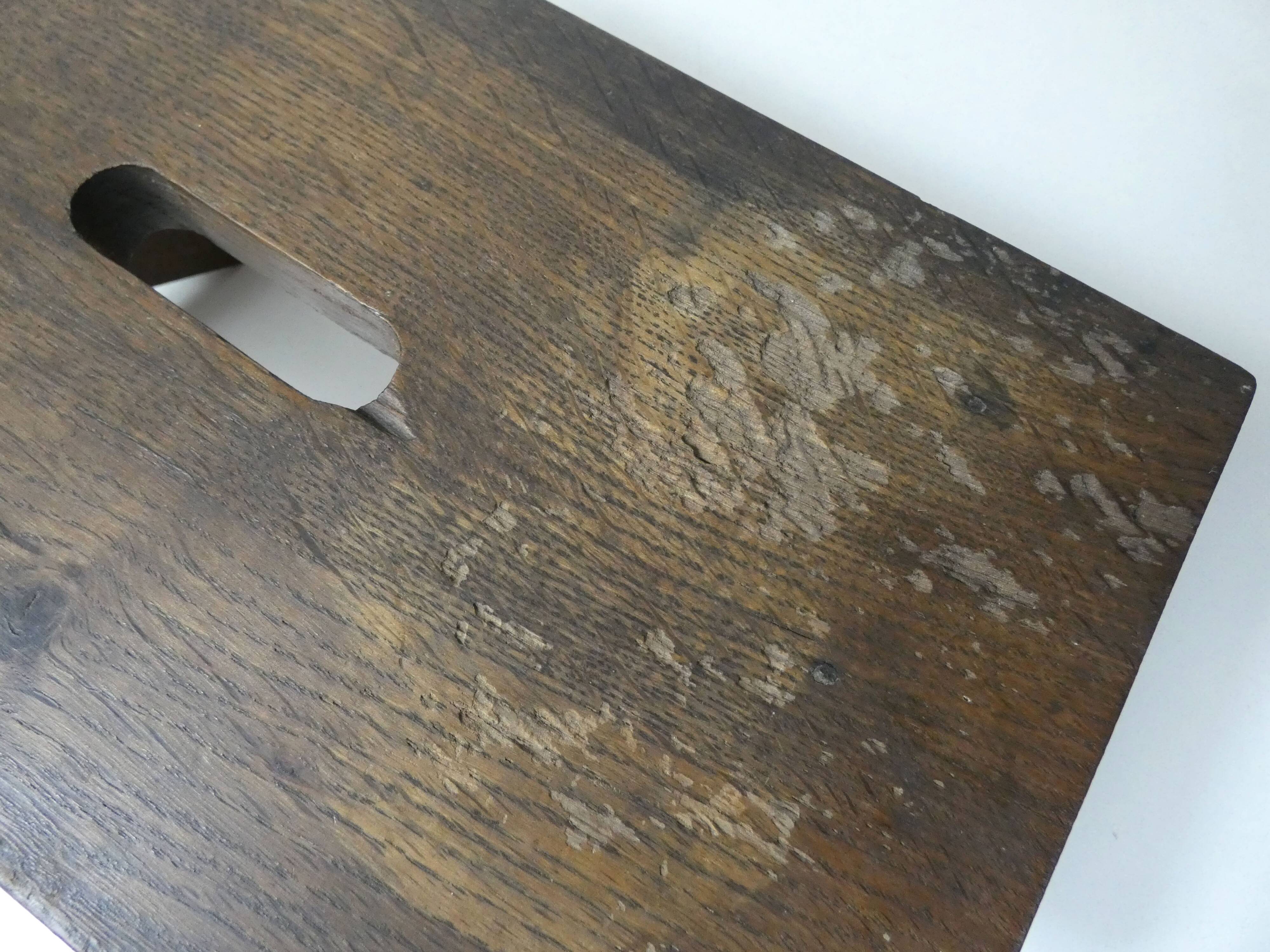 Old small wooden bench step in solid oak