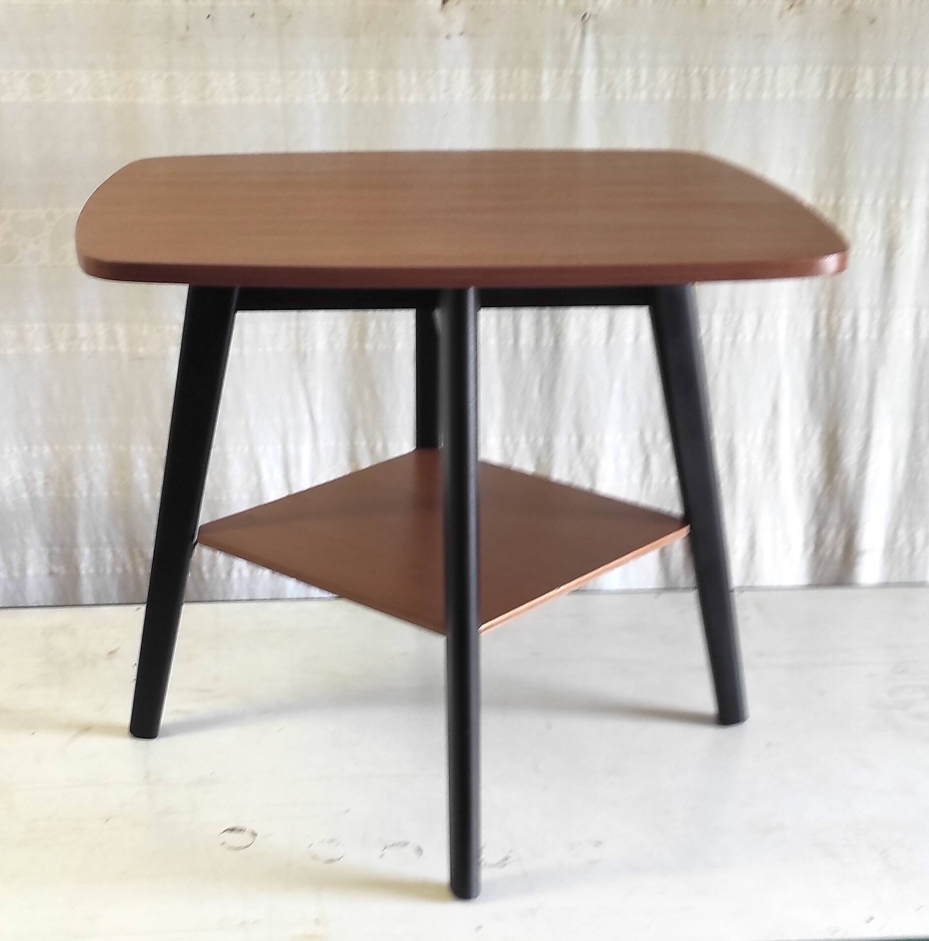 Modernist side table in wood, mid-20th century.
