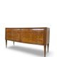 Veneered burl walnut chest of drawers with light warm brown glass top