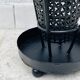 Vintage black perforated metal and brass umbrella stand