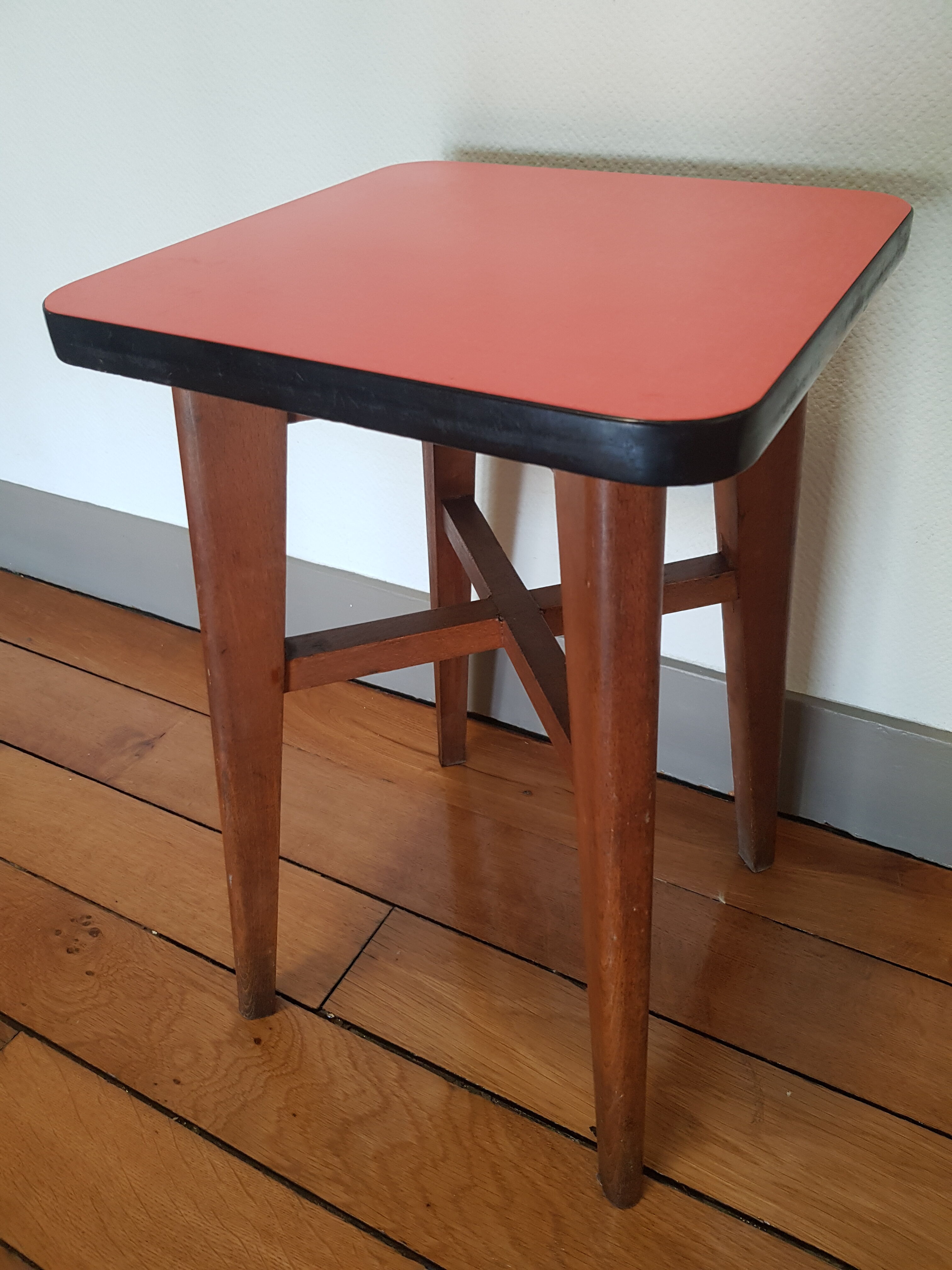 Wooden and red formica stool