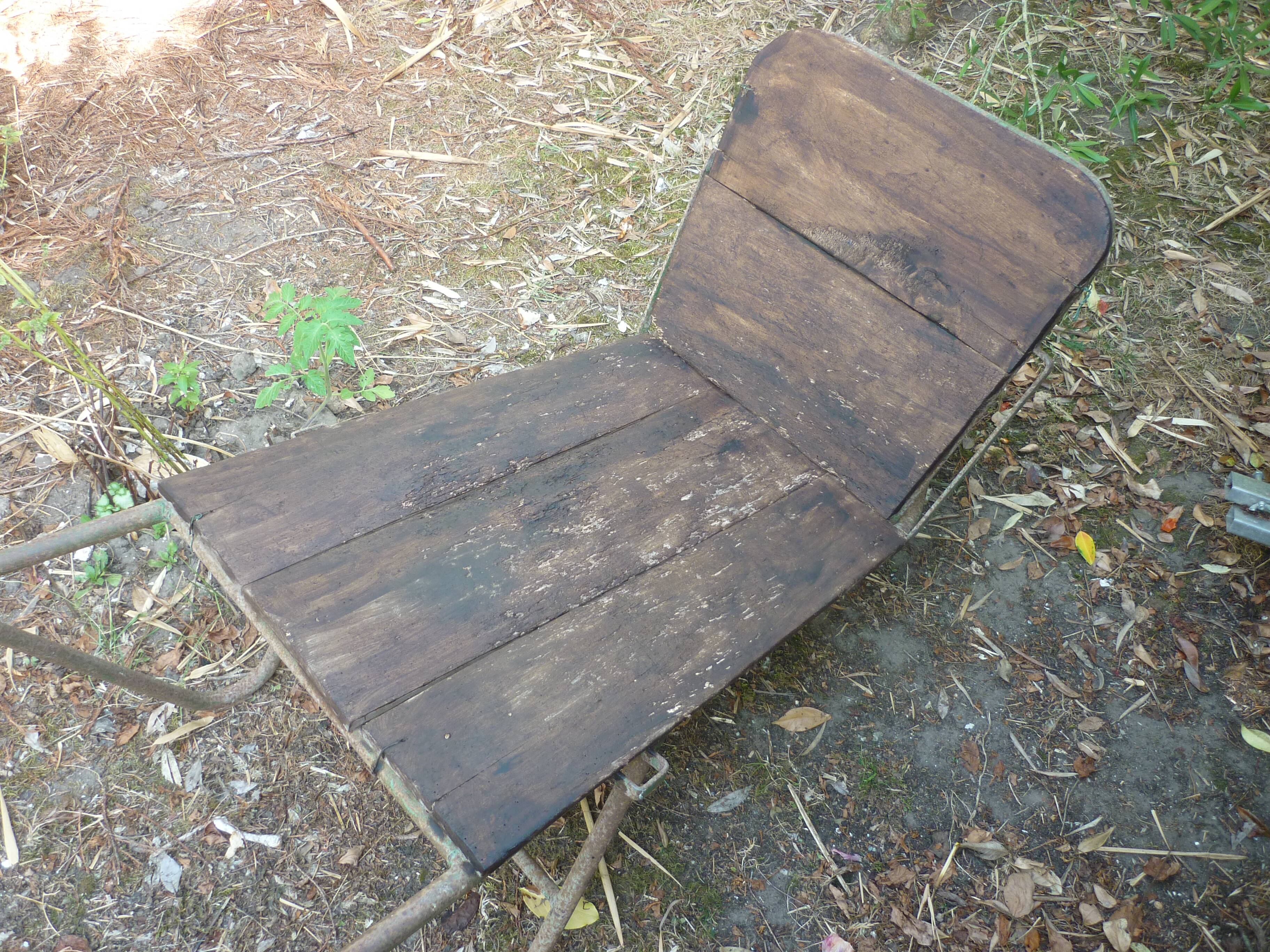 Former wooden and metal wheelbarrow