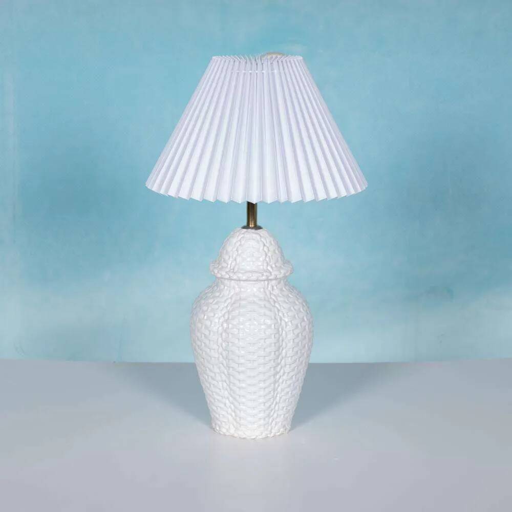 Vintage table lamp in woven ceramic Regency style.