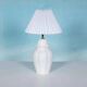 Vintage table lamp in woven ceramic Regency style.
