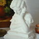 Limestone bust young girl who reads