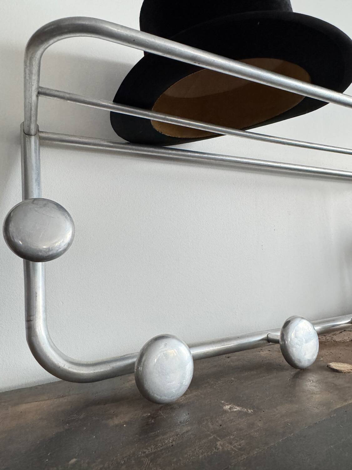 Vintage wall-mounted aluminum coat rack