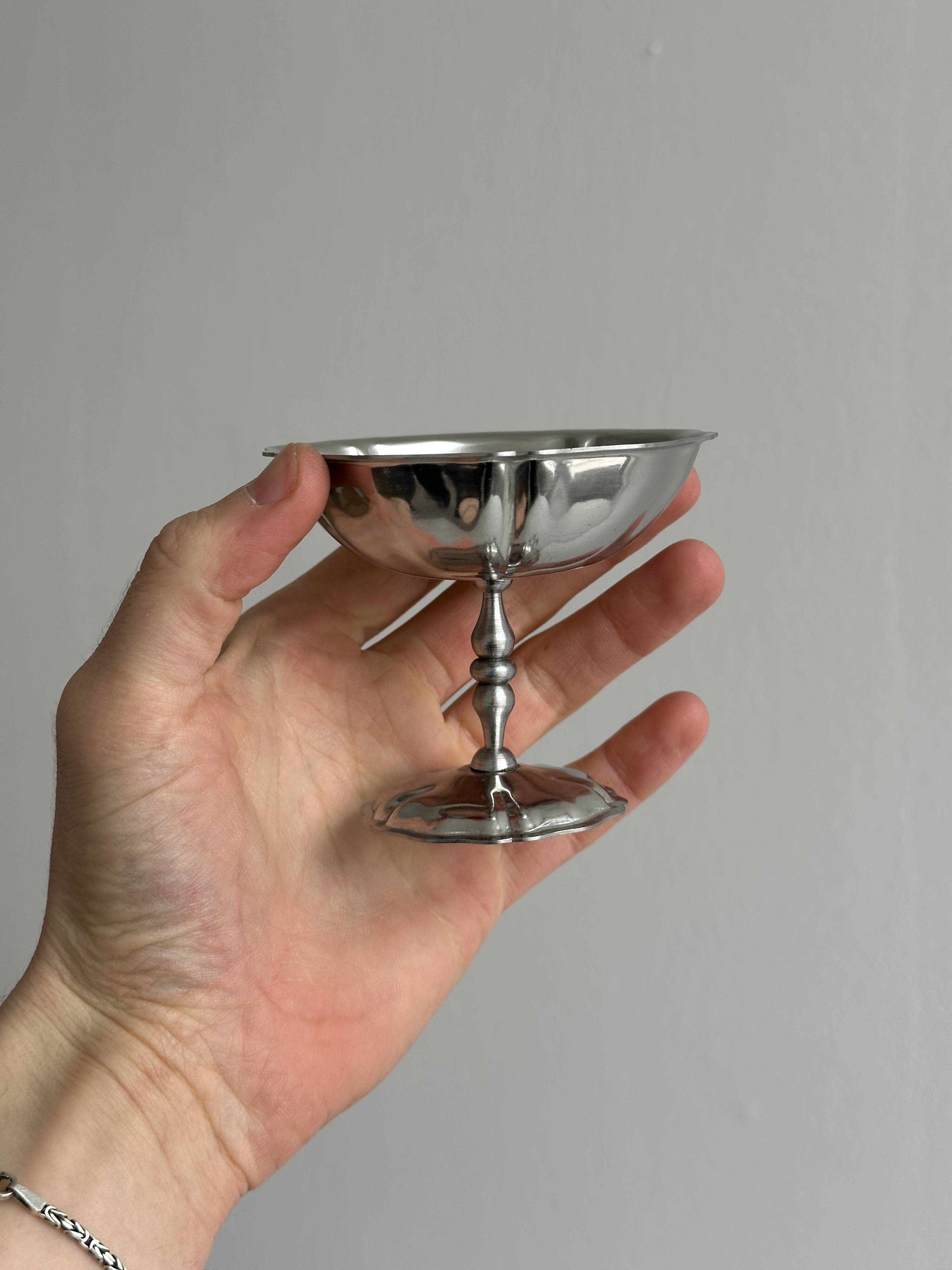 10 footed bowls in stainless steel in the style of Letang Remy