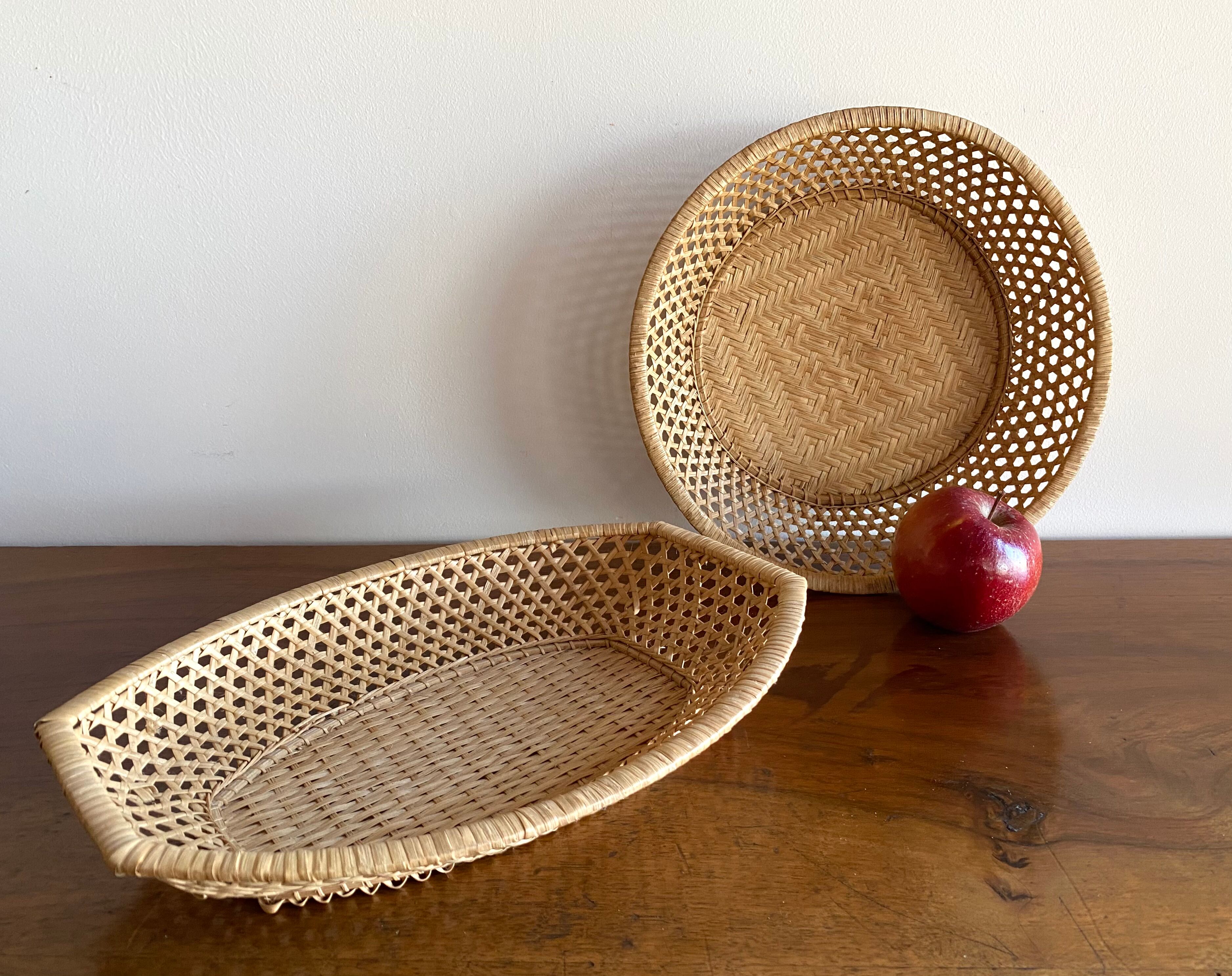 Pair of vintage braided rattan baskets