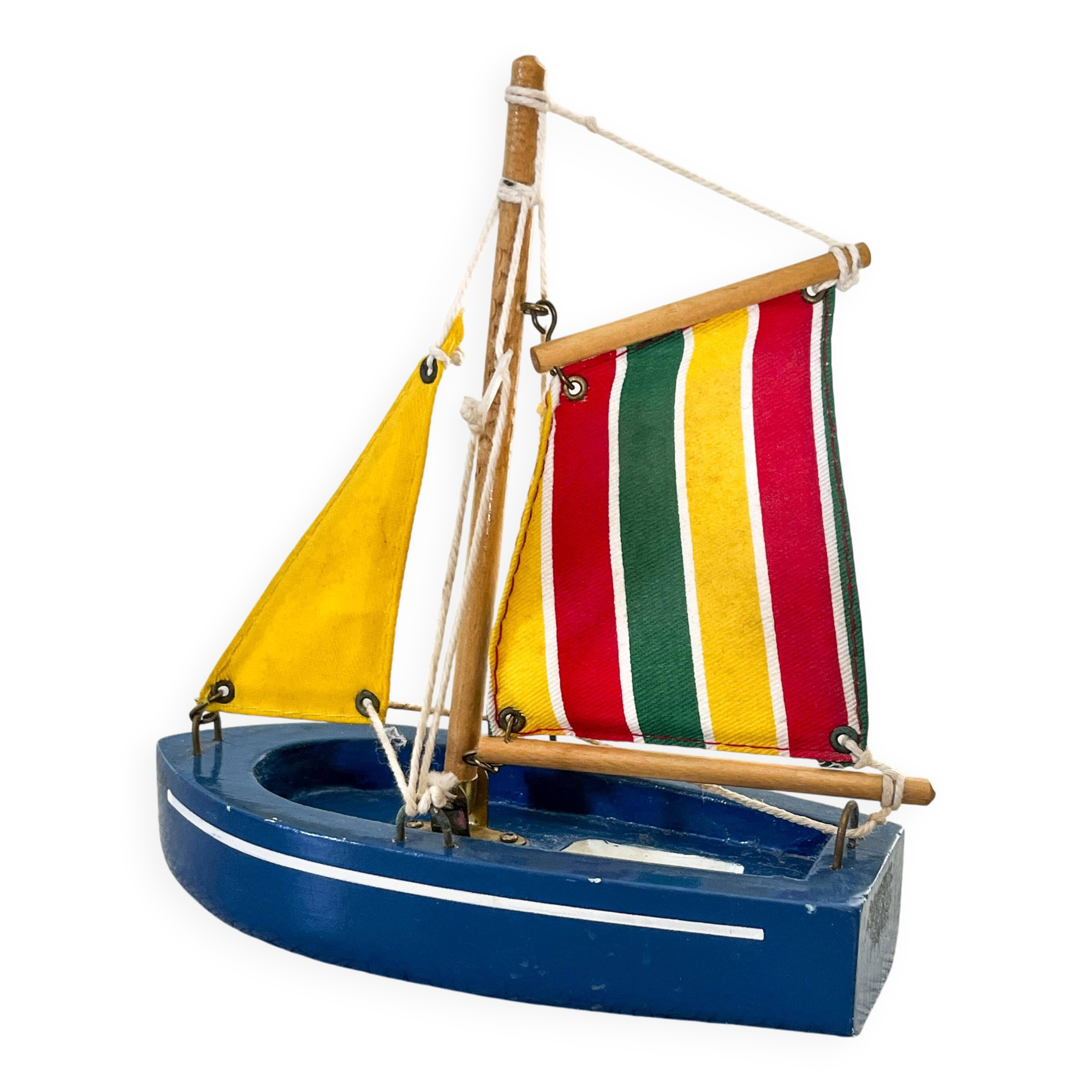 Wooden bathtub sailboat, perhaps a Tirot.