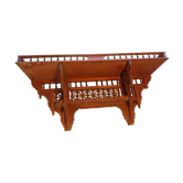 Cut wooden shelf