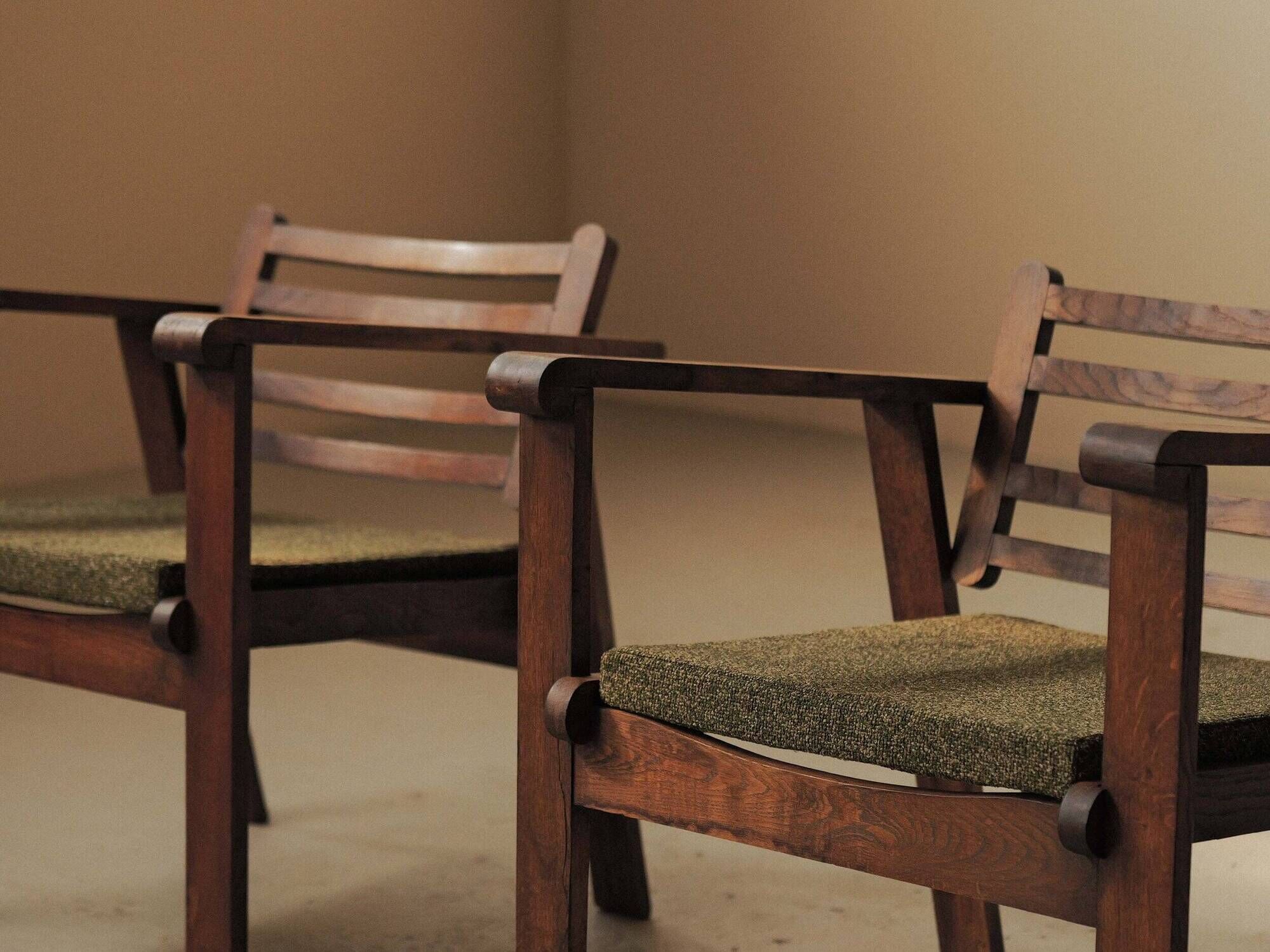 Pair of modernist armchairs in oak, Reconstruction, circa 1940