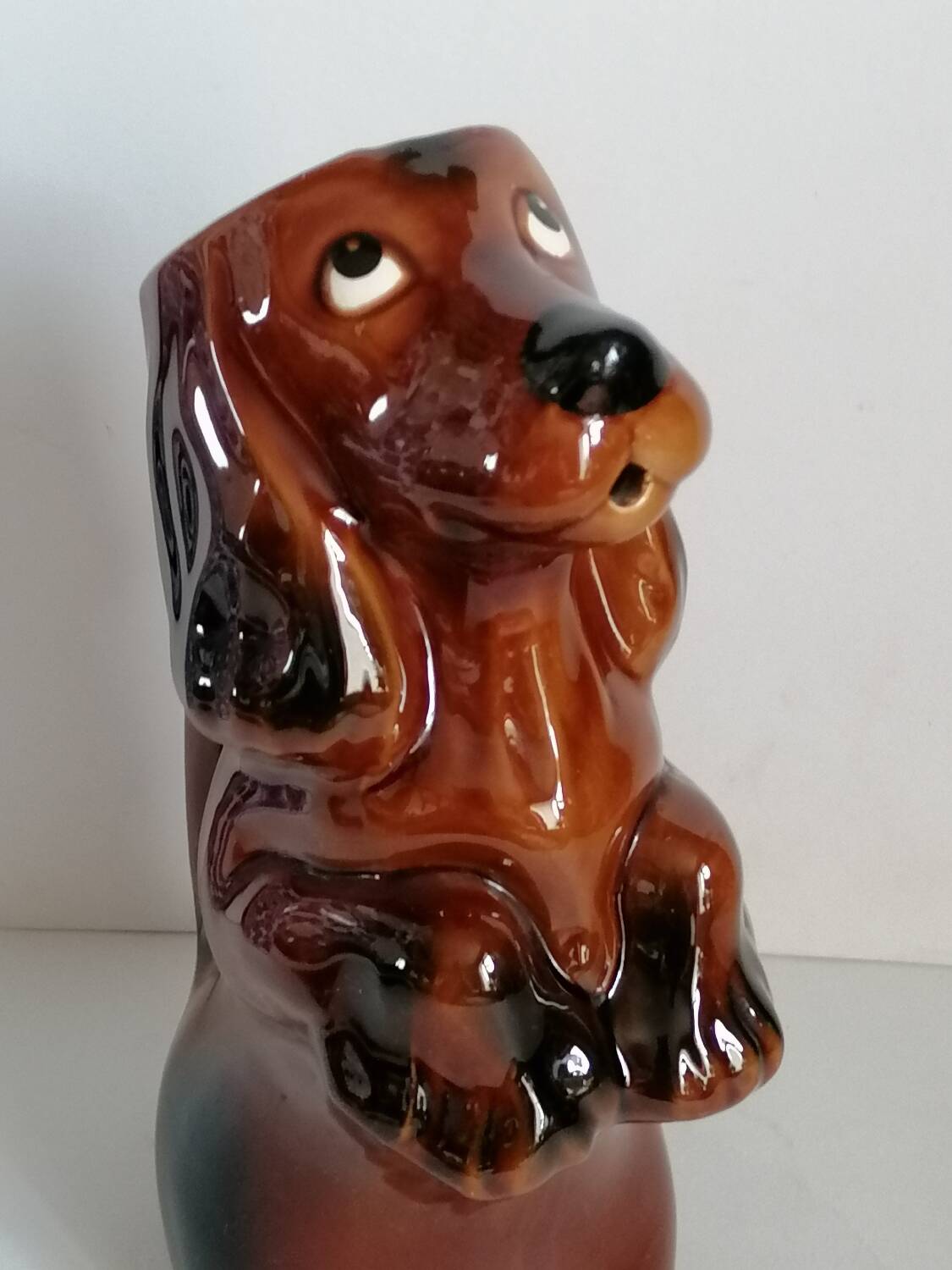 Zoomorphic dachshund dog pitcher in majolica slip