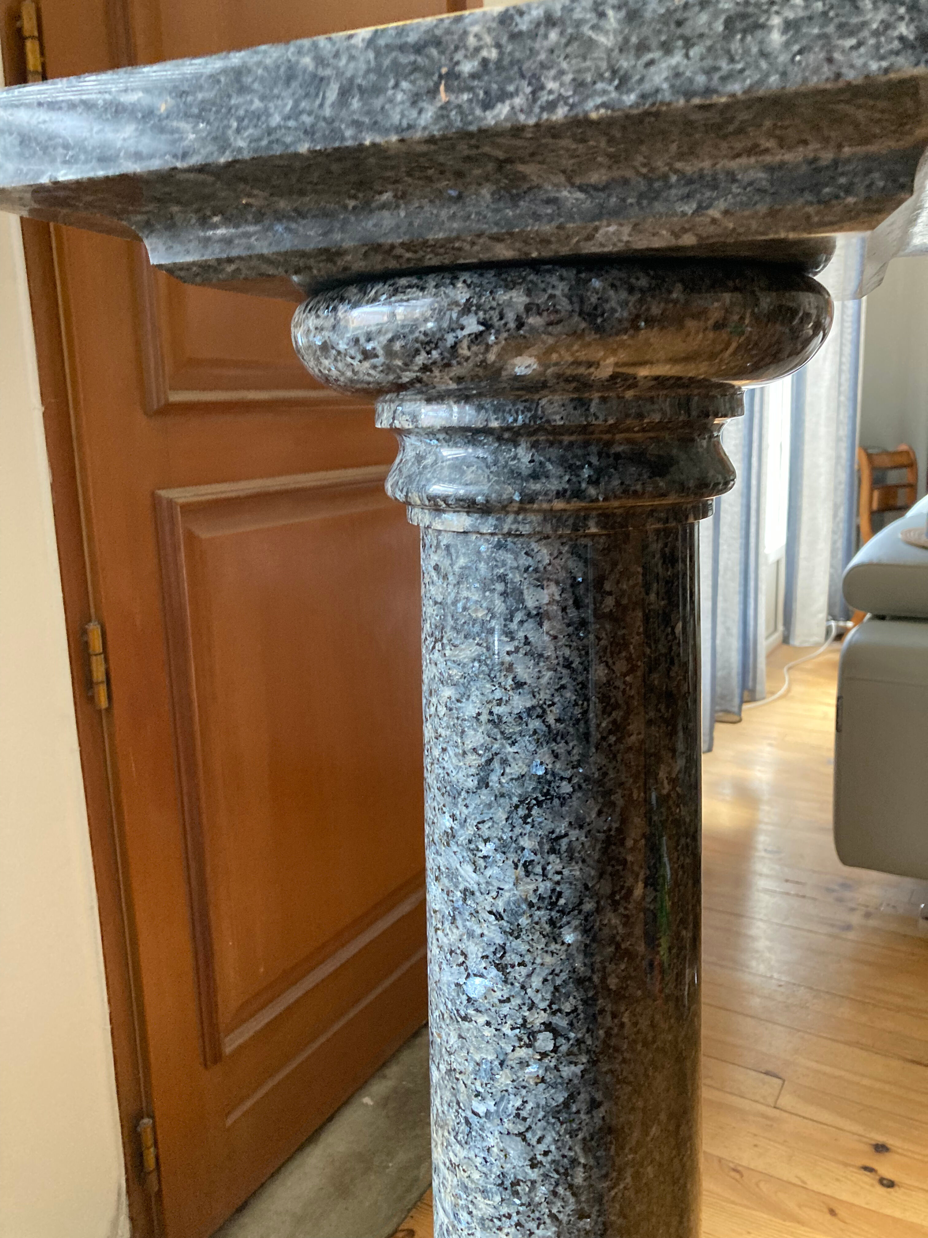 Granite column with pearly reflections
