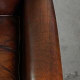 Vintage sheepskin armchair with beautiful warm colors and excellent seating comfort