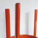 Chaise vintage en bois laqué orange et assise cannage