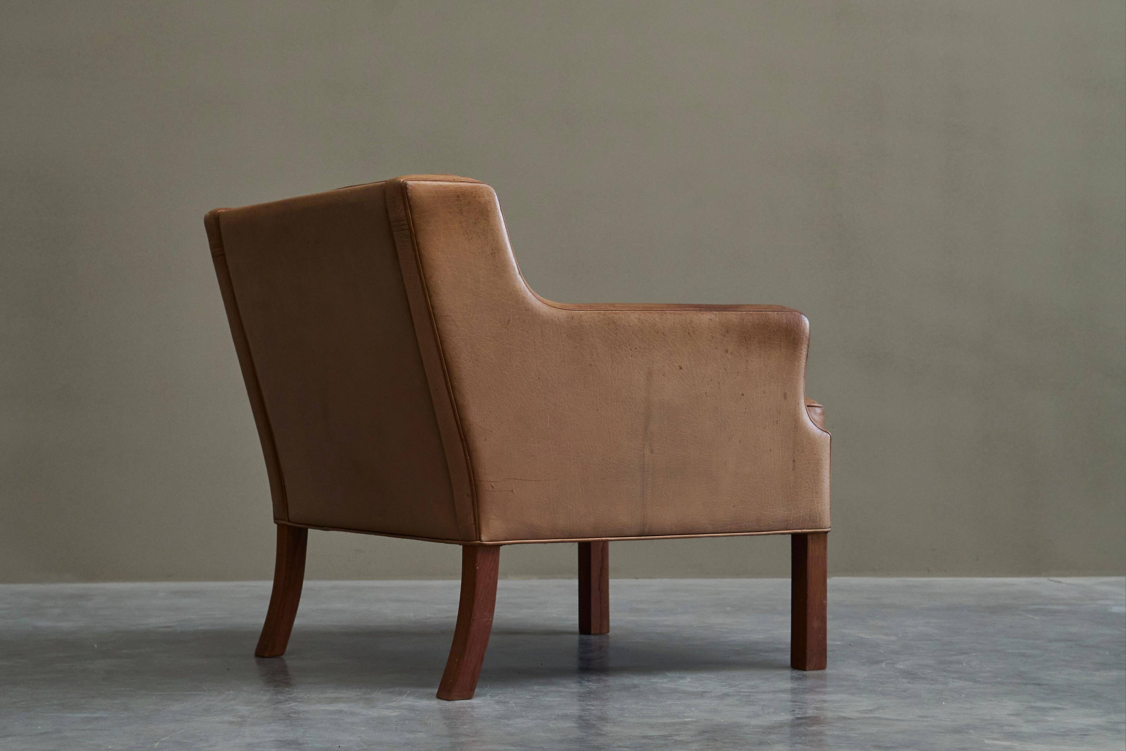 1970s patinated leather Scandinavian lounge chair