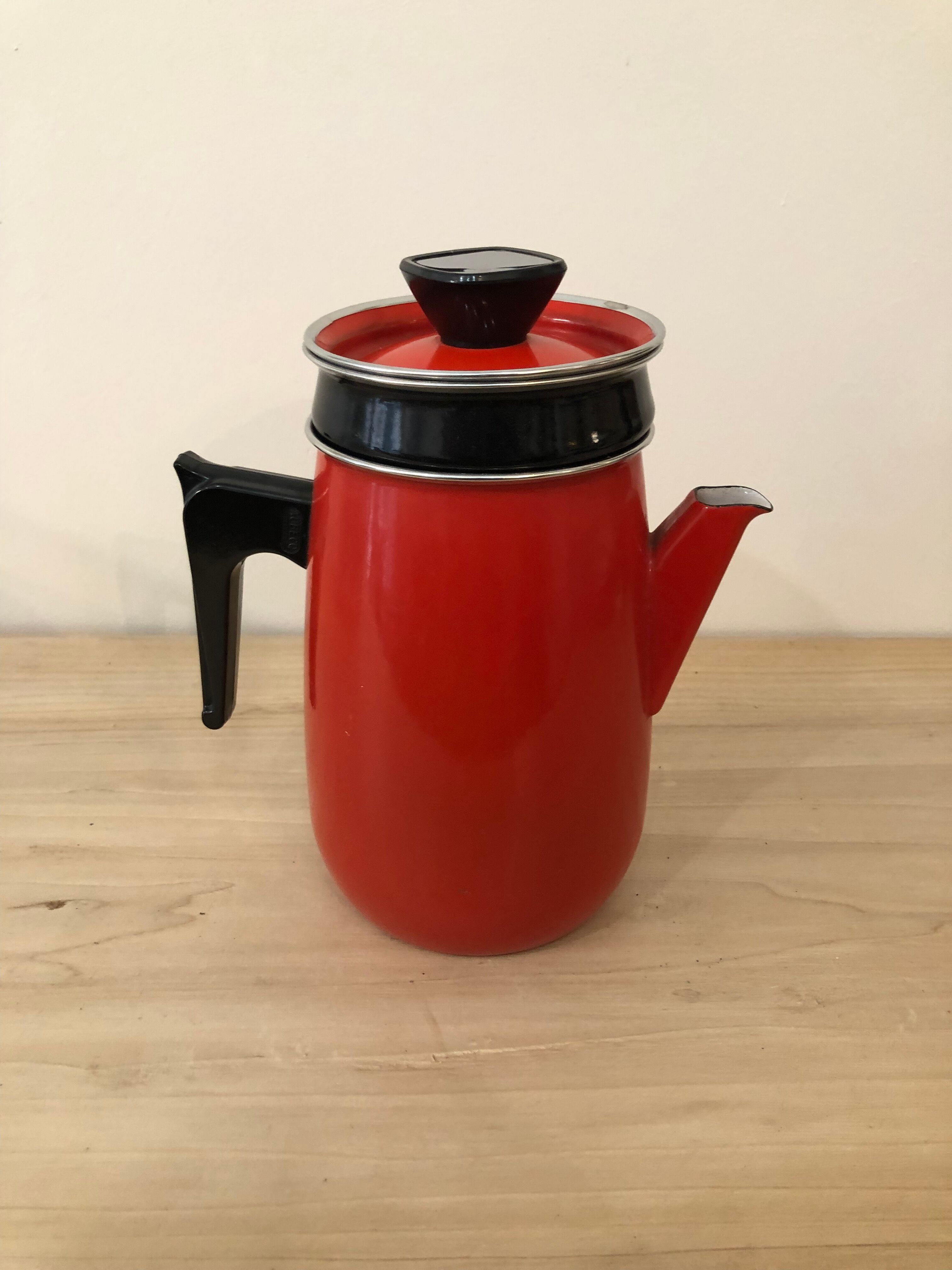 Red enamel coffee maker with filter