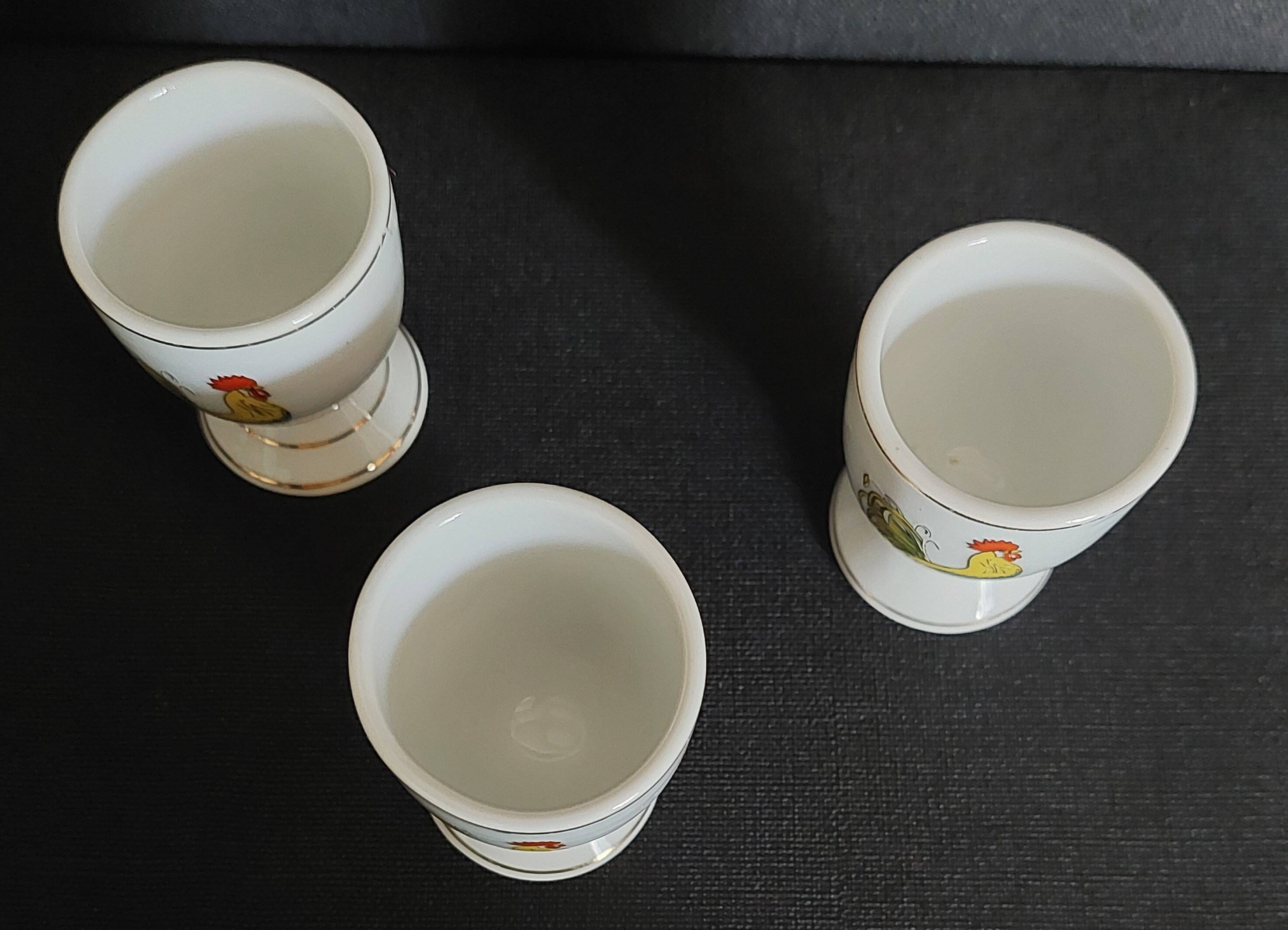 Porcelain egg cups with rooster decoration, set of three
