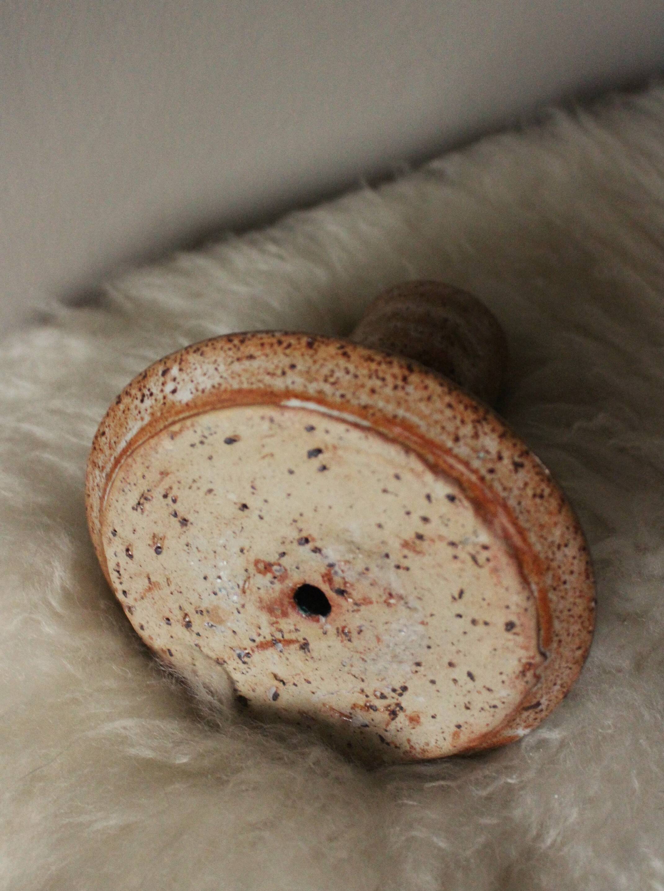Vintage speckled rust round stoneware candlestick