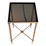 Gold brass side table in neoclassical style, circa 1960.