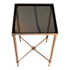 Gold brass side table in neoclassical style, circa 1960.