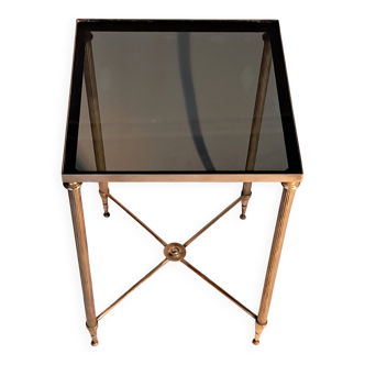 Gold brass side table in neoclassical style, circa 1960.