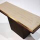 Minimalist console in travertine and patinated metal — 1970s