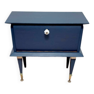 Old bedside table with compass feet