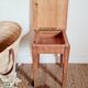 Wooden wax stool and orange formica